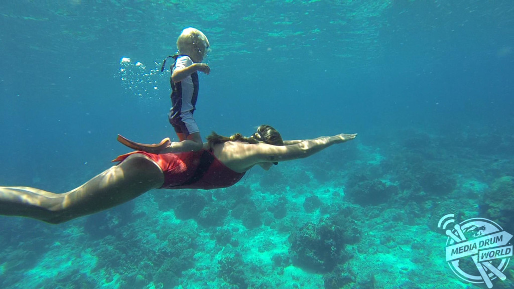 Fedor, aged two, freediving on his mum's back. 
