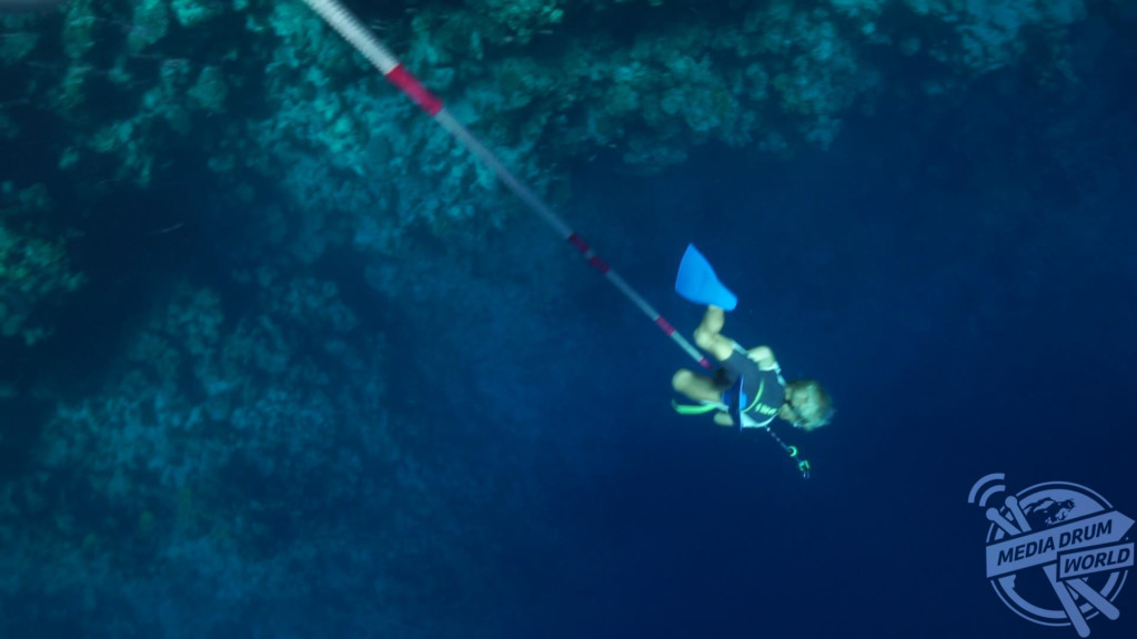 Fedor, aged three, using a rope to freedive. 