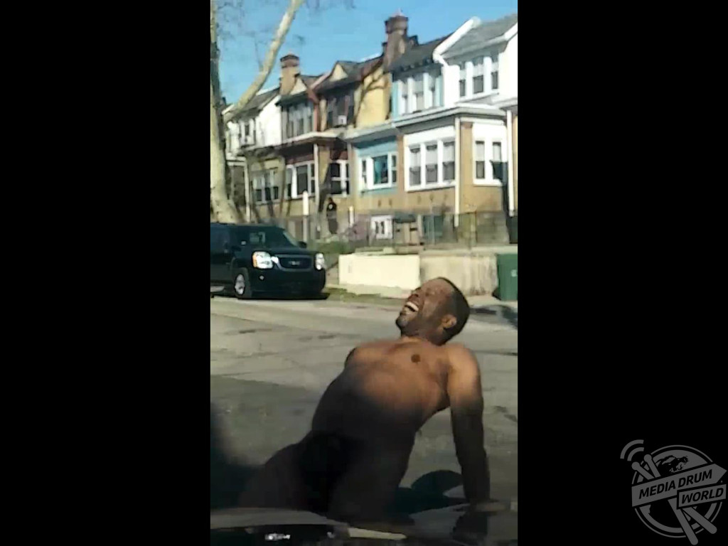 SHOCKING footage has emerged that shows police use a Taser to subdue a naked man who had been attacking parked cars.