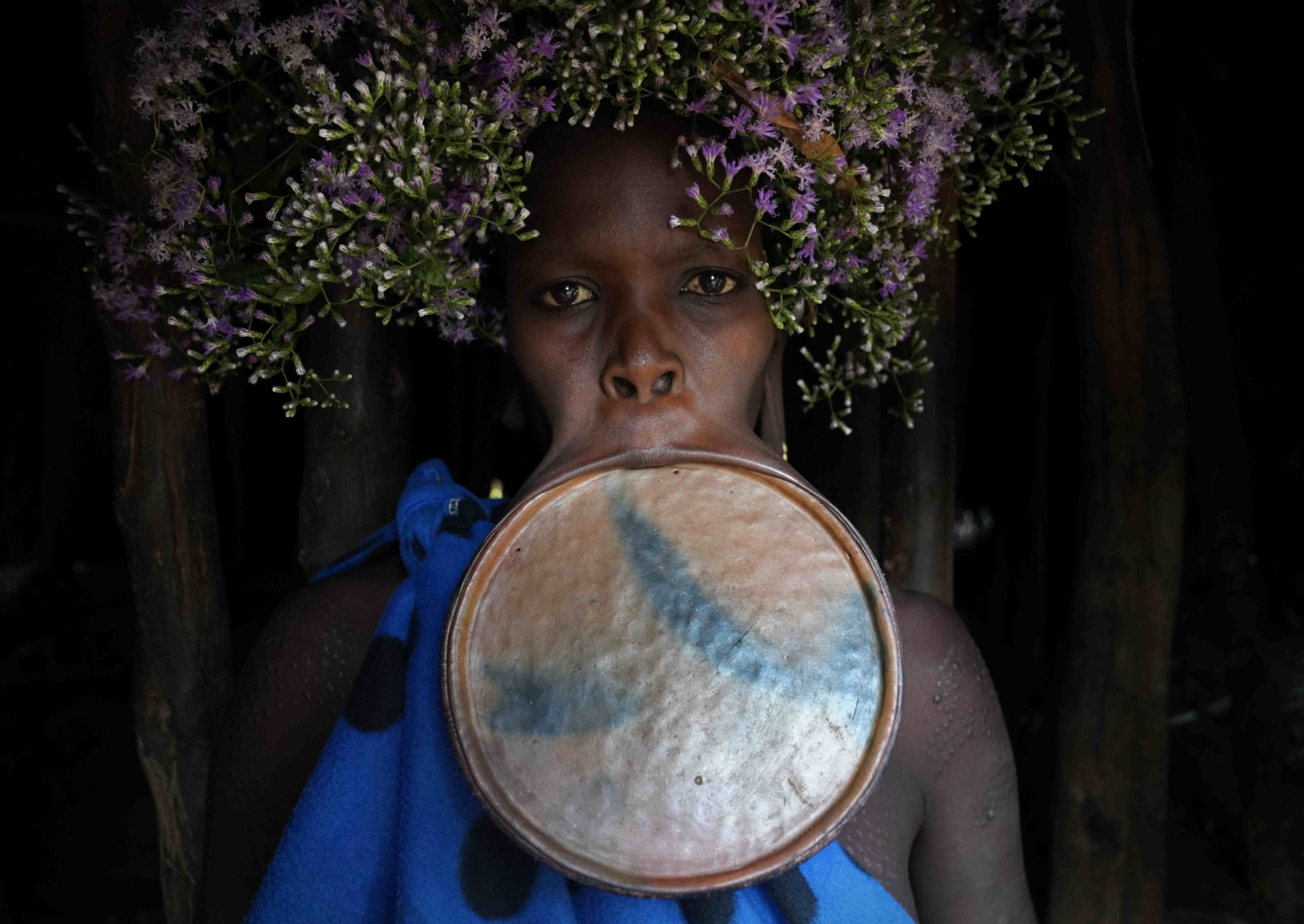 A Rare Look Inside A Tribe Where Women Wear Face Plates To Enhance Their Be...