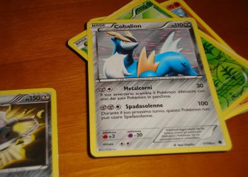 A collection of Pokémon trading cards laid out on a table