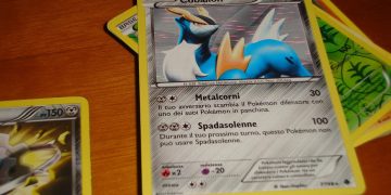 A collection of Pokémon trading cards laid out on a table