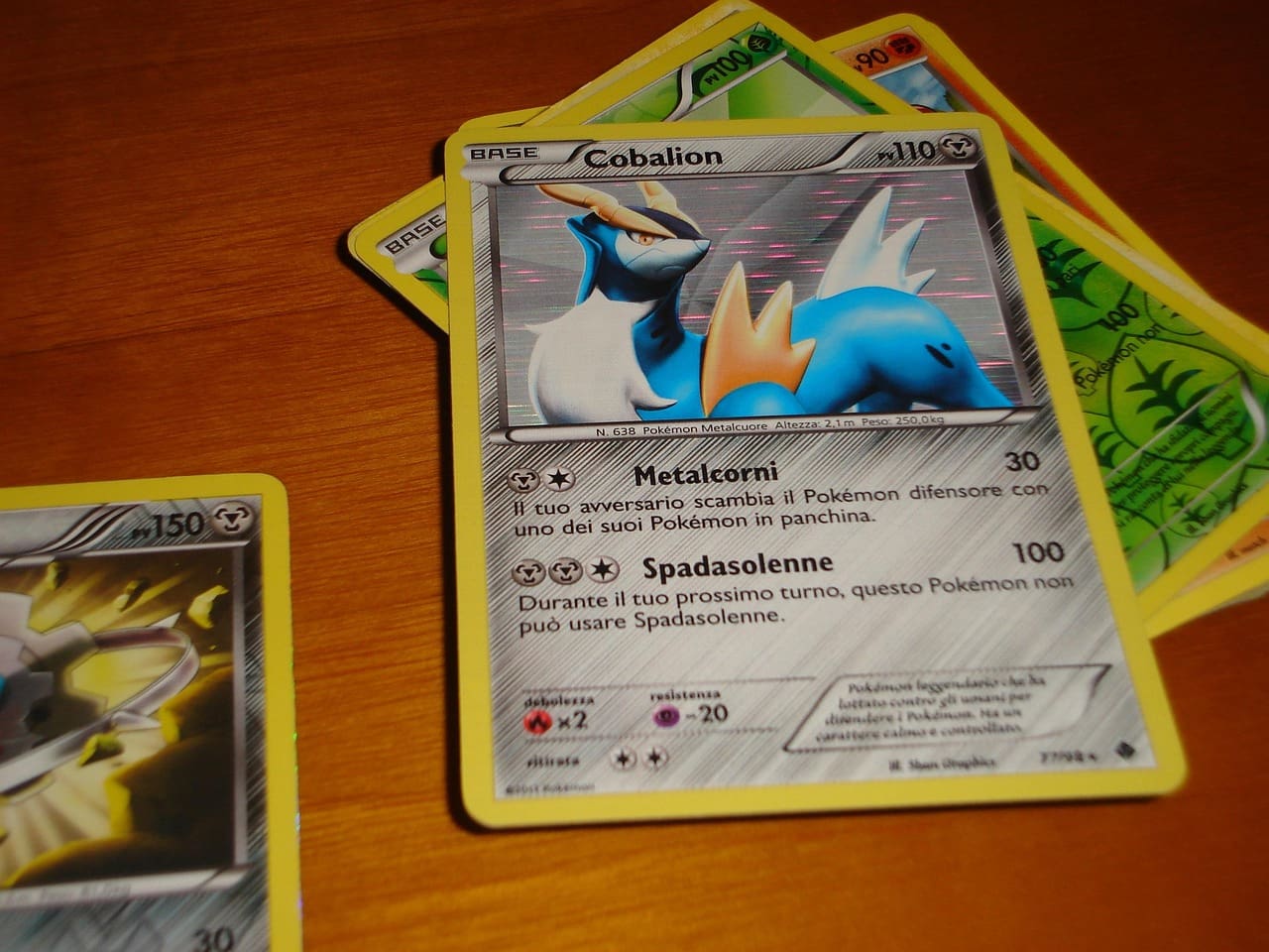 A collection of Pokémon trading cards laid out on a table